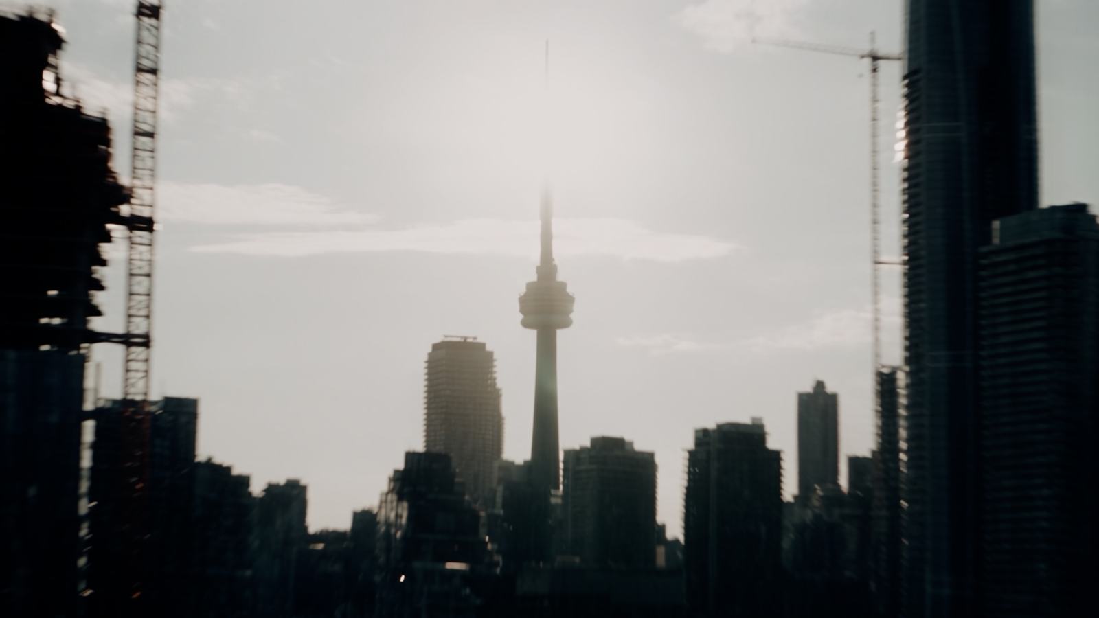 Soft-focus Toronto skyline with the CN Tower at sunset